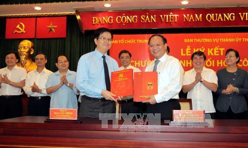 Ký kết chương trình phối hợp về xây dựng Đảng ảnh 1